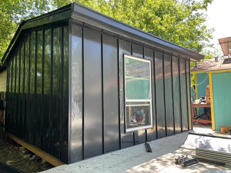 Black standing seam metal wall panels for Metal Roof Installation in Lindenhurst